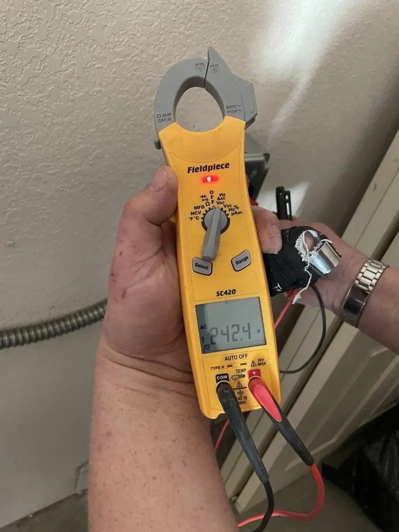 Voltage testing with clamp meter during Generator Installation in Barberton